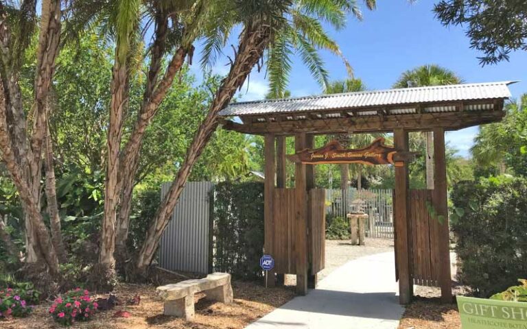 arbor gateway into bonsai garden with palms at heathcote botanical gardens fort pierce