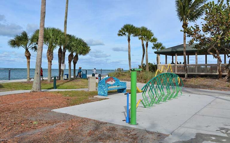 beachfront park with bike rack and painted bench at jetty park fort pierce