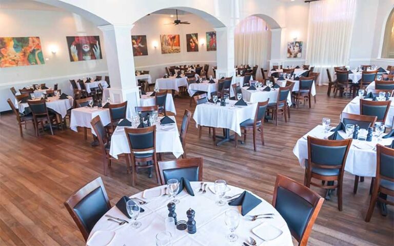 dining room with table settings at tutto fresco restaurant port st lucie