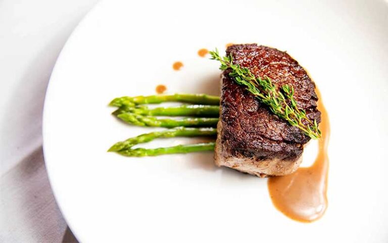 filet mignon with ornate garnish at meating street seafood steakhouse port st lucie