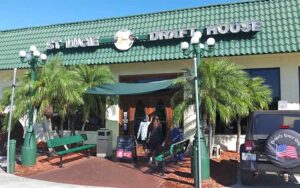 front entrance of restaurant with sign at st lucie draft house