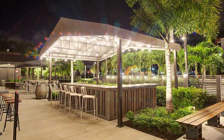 outdoor patio beer garden area with lights at american icon brewery vero beach