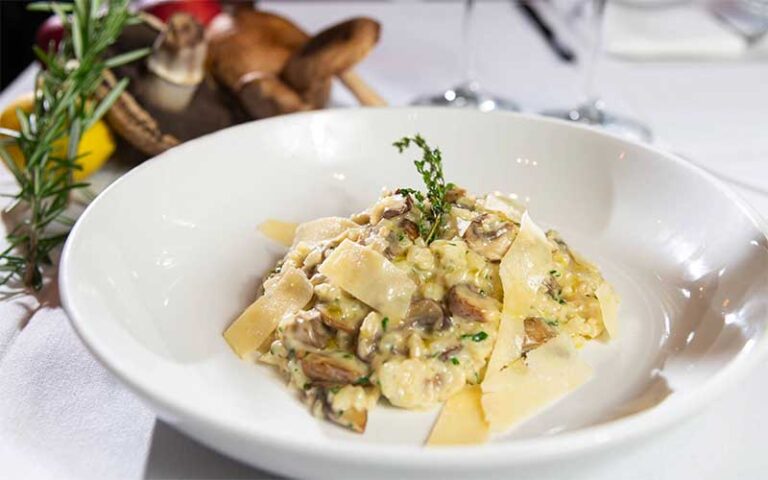 pasta dish plated with garnish at meating street seafood steakhouse port st lucie
