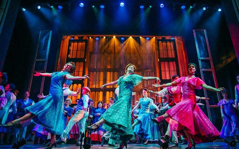 performers dancing on stage at historic cocoa village playhouse