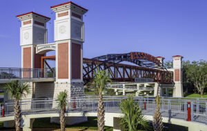 red brick bridge with kissimmee trail signs skywalk over highway downtown kissimmee