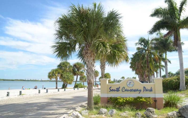 roadside sign with inlet and pathway at south causeway park fort pierce