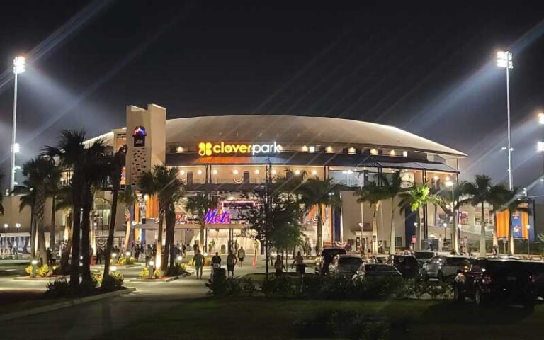 stadium exterior at night with lights at clover park port st lucie