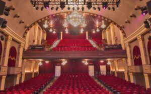 theater interior with chandeliers and opera boxes at historic cocoa village playhouse