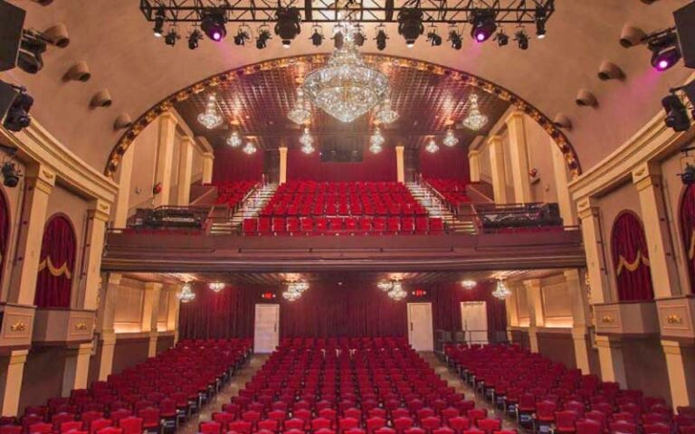 theater interior with chandeliers and opera boxes at historic cocoa village playhouse
