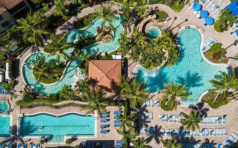 aerial view from above of pools and lazy river at naples bay resort marina