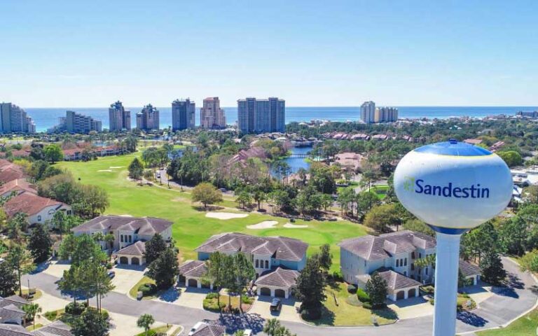aerial view of community with hotels and water tower at sandestin golf beach resort miramar beach