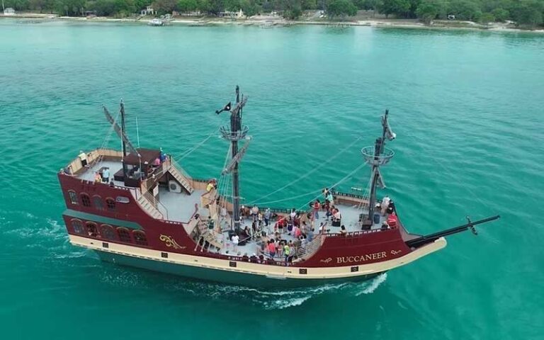 aerial view of period galleon ship with pirate theme in green bay at buccaneer pirate cruise destin