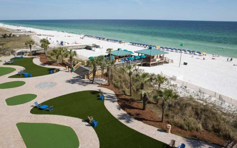 beach access with loungers and lawn areas at the island resort fort walton beach
