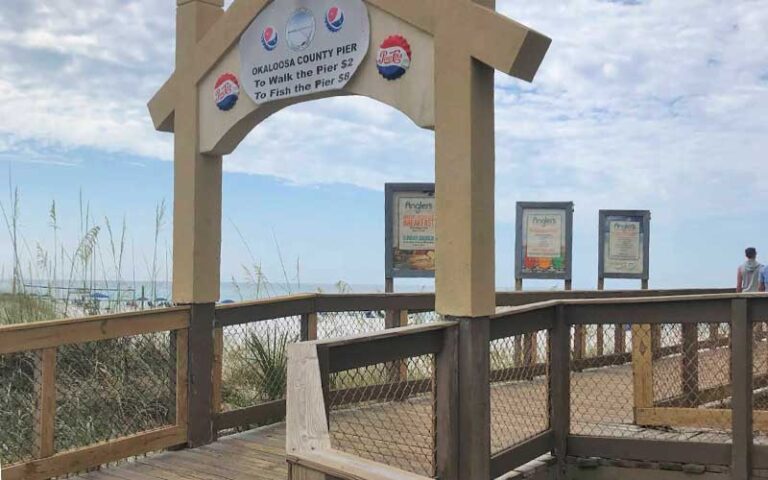 boardwalk gate entrance with prices at okaloosa island pier