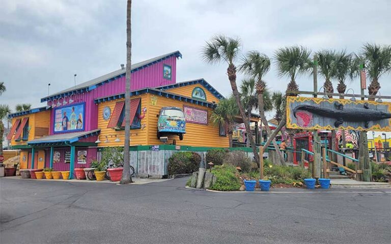 colorful buildings exterior from parking area at gator beach destin