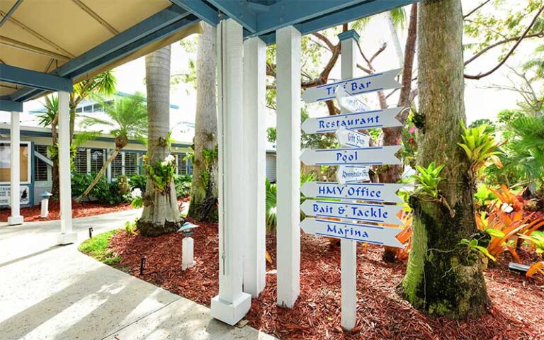 covered pathways with arrow sign at pirates cove resort marina stuart