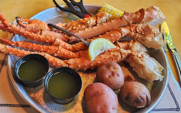 crab legs platter with potatoes and corn at old bay steamer fort walton beach