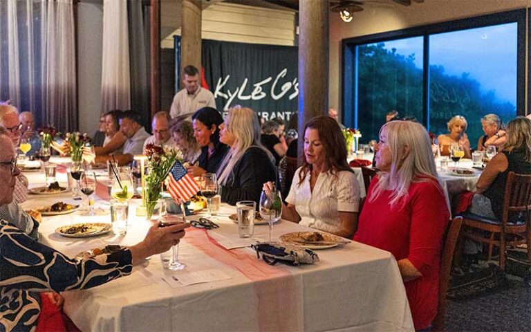 diners in formal restaurant with server at kyle gs prime seafood steaks hutchinson island south