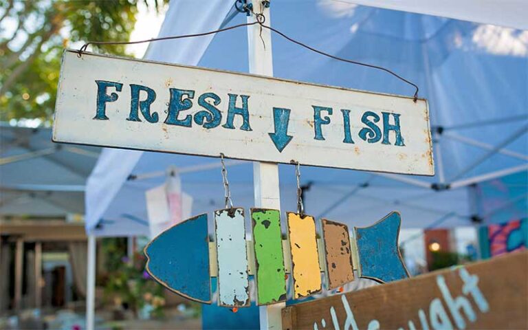 fresh fish sign at market booth at third street south farmers market naples