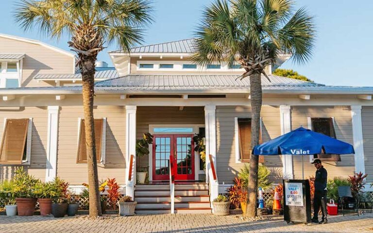 front exterior of restaurant with valet booth at cafe thirty a santa rosa beach