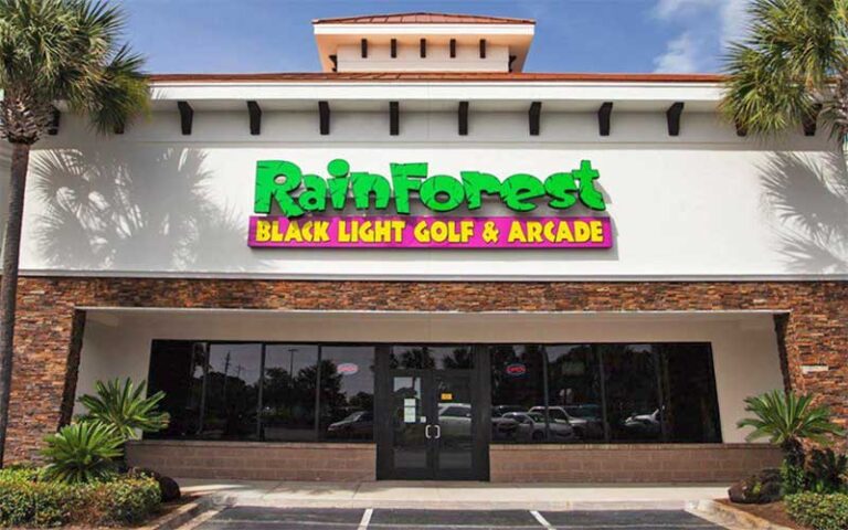 front exterior with sign and entrance at rainforest black light golf arcade miramar beach