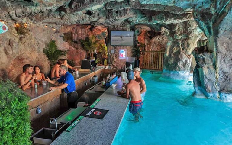 grotto with wet bar swimming pool at the island resort fort walton beach