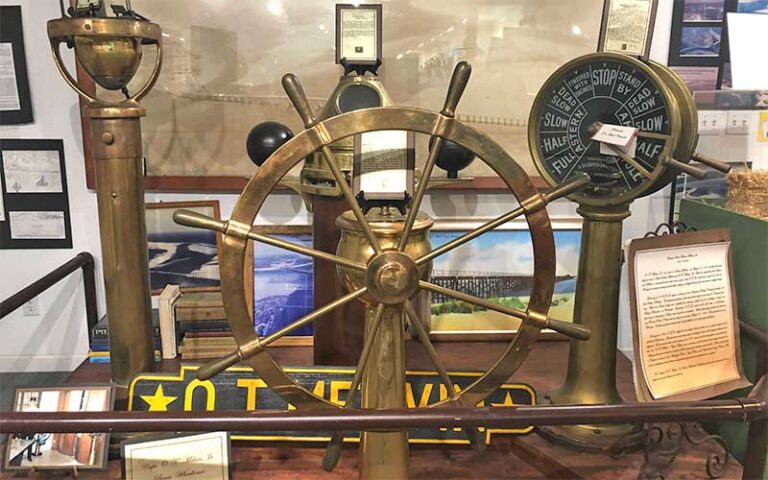 helm wheel and brass ship fixtures at destin history fishing museum
