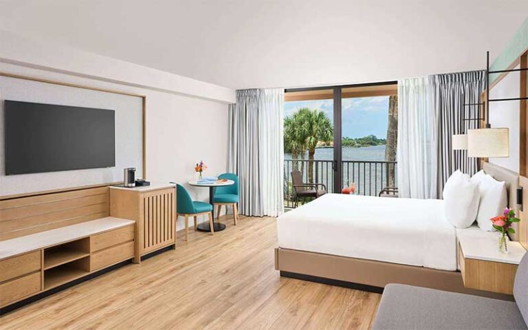 king size bed guest room with view at sandpiper bay all inclusive resort port st lucie