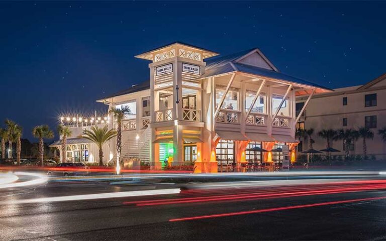 long exposure street night view of lighted restaurant at shunk gulley oyster bar santa rosa beach 30a