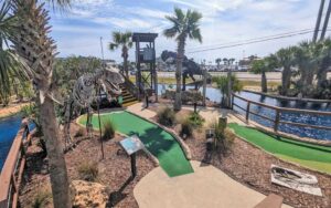 mini golf course with dinosaur theme at wild willys adventure zone fort walton beach