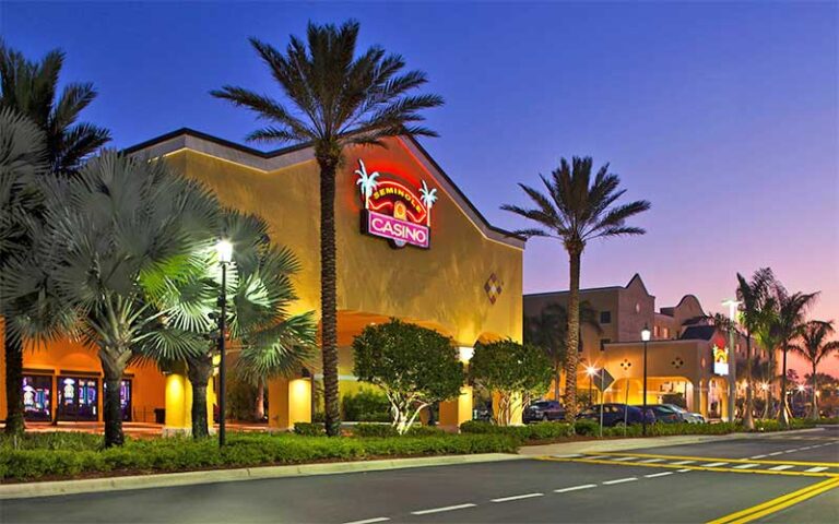 night exterior of hotel with palms at seminole casino hotel imokalee