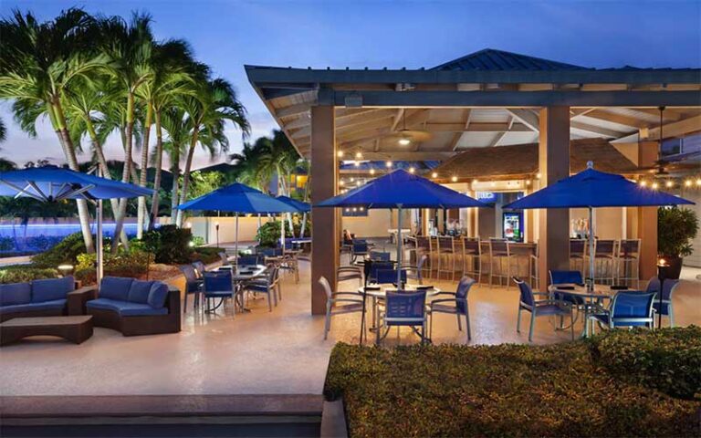 outdoor patio pool area with twilight sky at marriott hutchinson island beach resort golf marina stuart