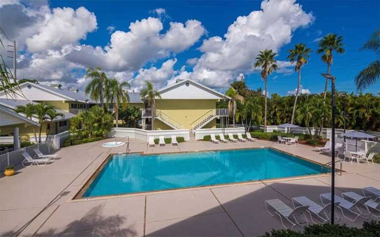 pool area with loungers at best western port st lucie