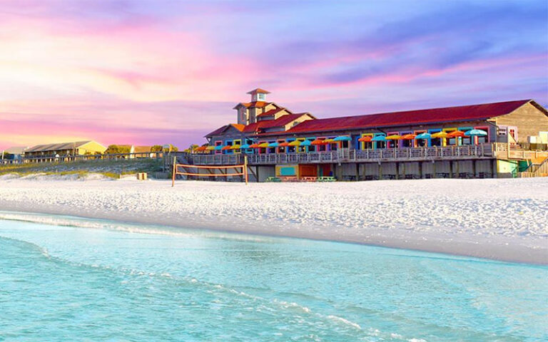 restaurant exterior on beach with twilight sky at pompano joes destin