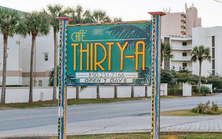 roadside entrance sign at cafe thirty a santa rosa beach