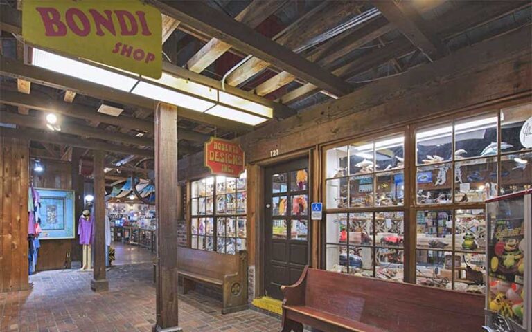 rustic indoor mall with store front at tin city waterfront shops naples