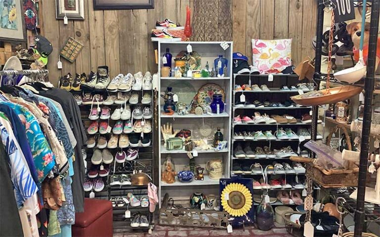 store shelves with resale clothing and shoes at defrance indoor flea market antiques collectables fort walton beach