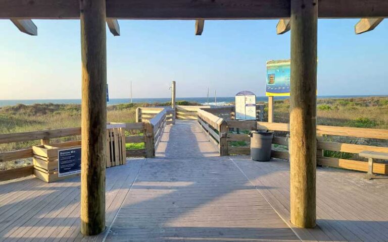 view from park pavilion of boardwalk with beach access at john beasley park fort walton beach