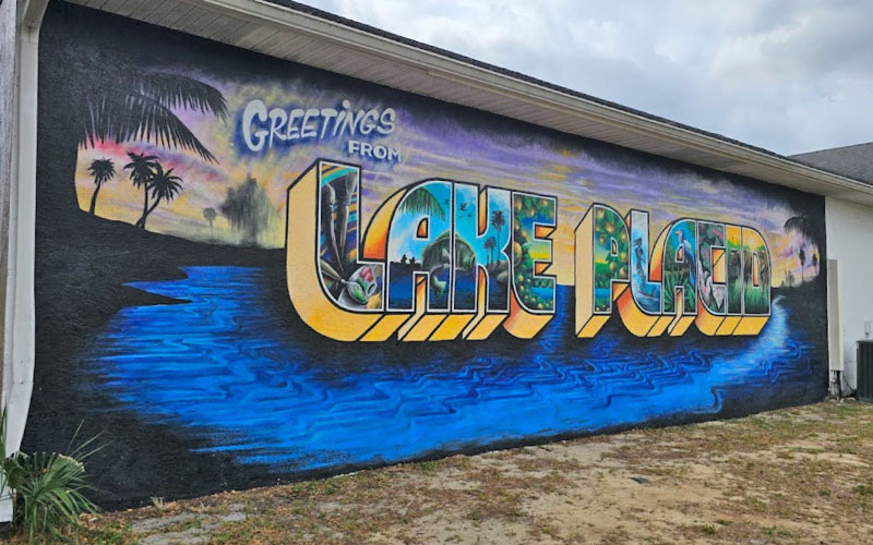 exterior wall mural with greetings from lake placid