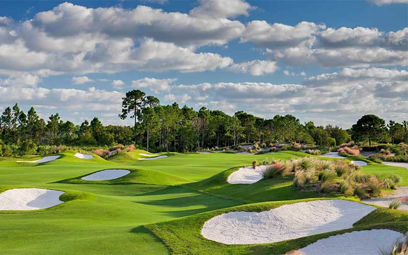 golf course with greens and bunkers on pga dye port st lucie