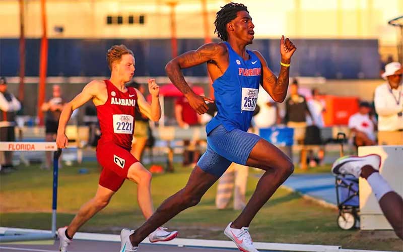 relay racers running in event at florida gators