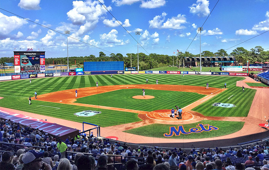 baseball game at clover park with mets logo and crowd