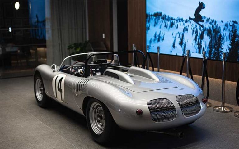 classic race car on display with video at revs institute naples