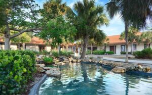 exterior of buildings with garden at marco island historical museum