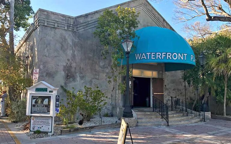 front exterior of theater with sign and awning at waterfront playhouse theater key west