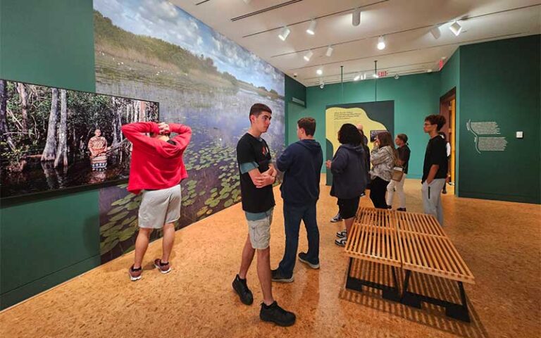 patrons viewing native american art exhibits the baker museum artis naples