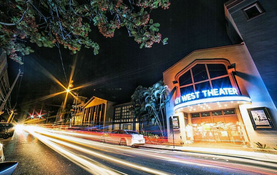 long exposure view at night with traffic light trails and key west theater