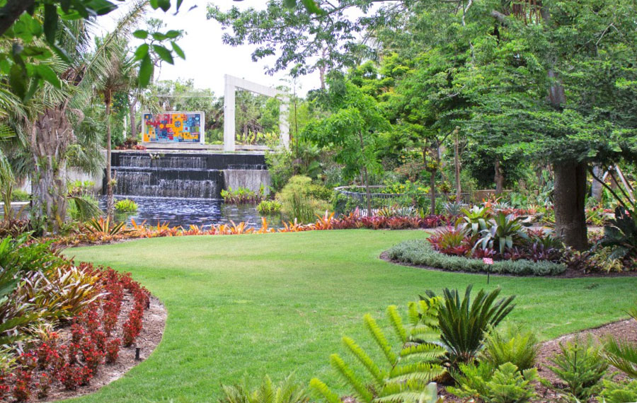 artistic fountain water feature in garden area with paths at naples botanical garden
