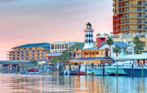 twilight view from harbor of harborwalk village destin