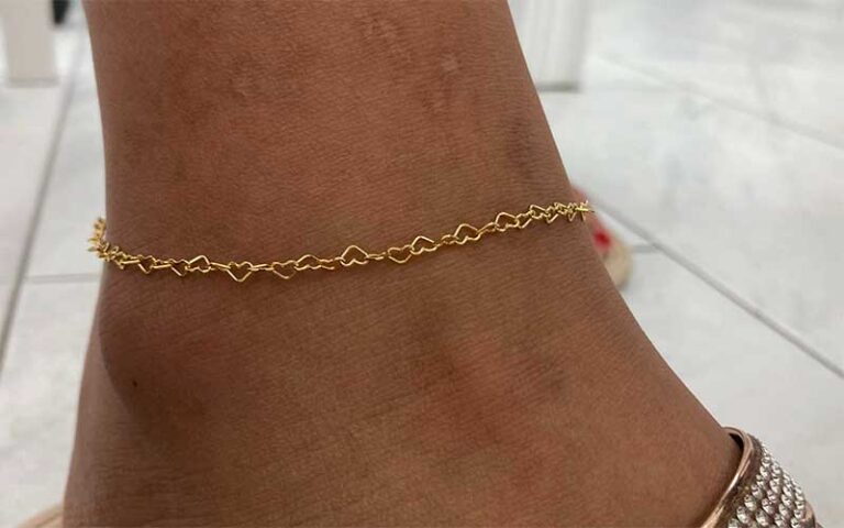 ankle with heart link chain at permanent jewelry miami orlando